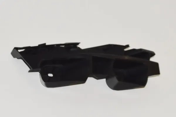 Soporte delantero izquierdo para aleta delantera 565807393B VAG