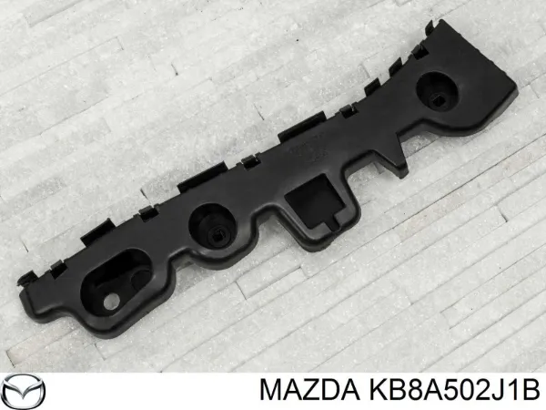 Guía izquierda del parachoques trasero KB8A502J1B Mazda