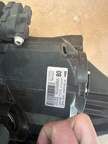 Faro izquierdo 8115002460 Toyota