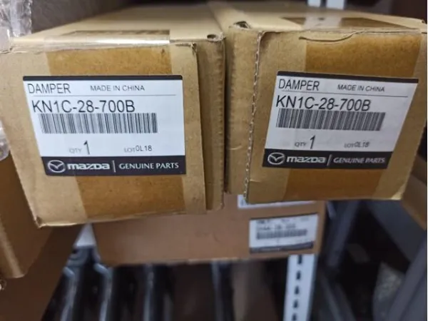 Amortiguadores traseros Mazda KN1C28700B