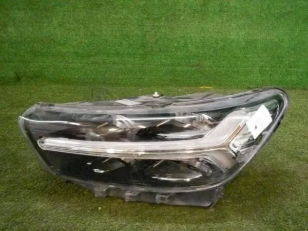 Faro izquierdo 31655989 Volvo