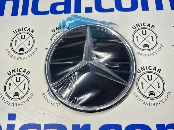 Emblema de la parrilla del radiador A000880030064 Mercedes